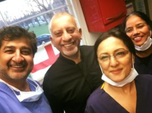 Dentists and Participants From a Dental Implant Coursecing Dental Implants in Surgery